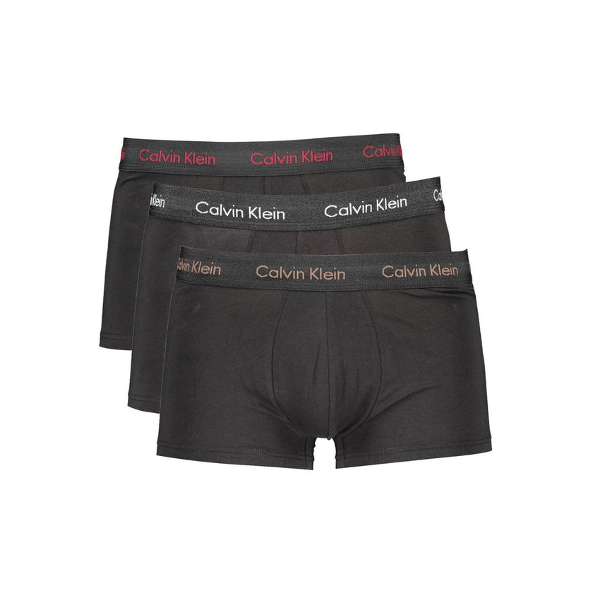 Black Cotton Men BoxerUnveil your daring side with Calvin Klein’s premier tri-pack boxer briefs. This sophisticated trio boasts an iconic elastic waistband in assorted colors that echo bold contrast and underscore the unmistakable Calvin Klein logo. Craft