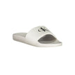 White Polyester Women SandalIndulge in the epitome of contemporary chic with these Calvin Klein logo-print sliders. Perfect for a stylish escape to the poolside or a casual stroll in the city, these sandals embody the effortless elegance synonymous with C
