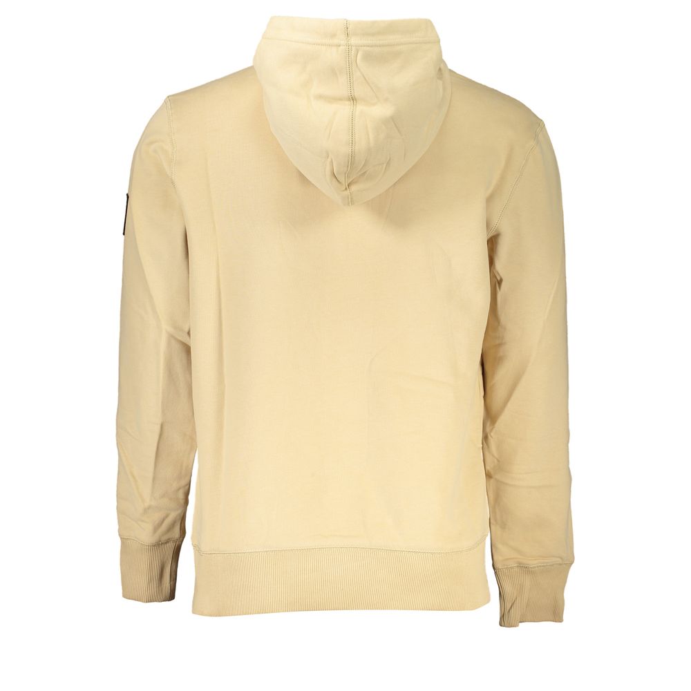 Beige Cotton Men SweaterStep into the spotlight with Calvin Klein’s vision of modern sophistication. This plush sweatshirt exemplifies superior comfort with its brushed interior and classic central pocket—perfect for the contemporary man seeking a blend o