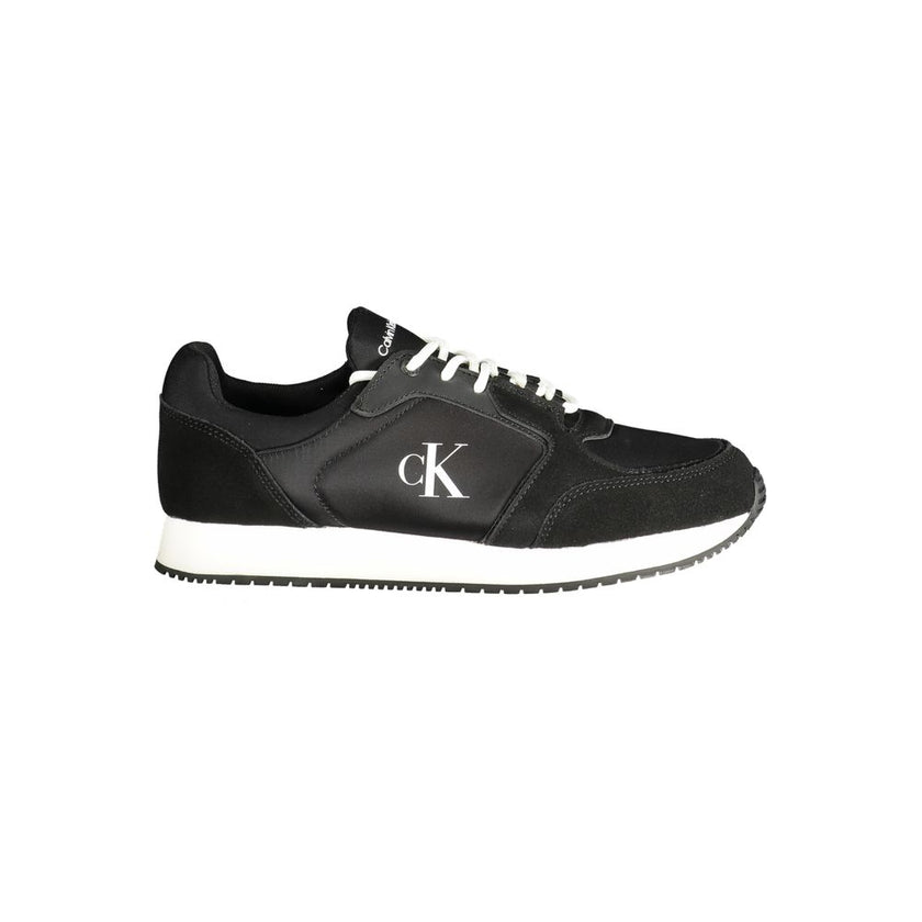 Black Polyethylene Men SneakerStep up your footwear game with these exquisite Calvin Klein sneakers, where modern design meets undeniable comfort. These kicks serve up a sleek black hue, featuring bold contrasting details that catch the eye. Suited for th