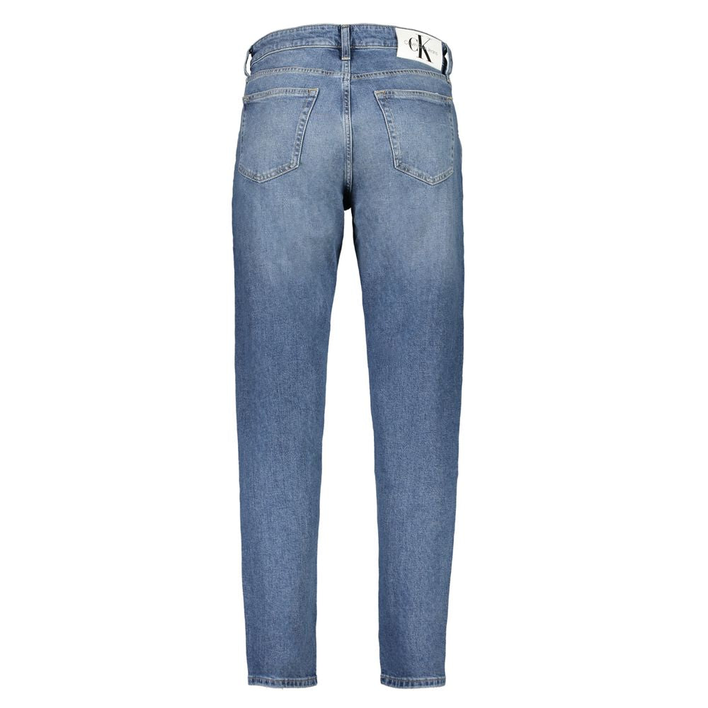Blue Cotton Men JeansDive into the perfect blend of comfort and style with these Calvin Klein Regular Taper Jeans. Crafted for the modern man, these jeans boast a washed effect that exudes a sense of laid-back sophistication. The fusion of cotton and elas
