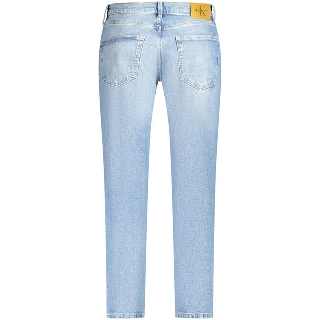 Blue Cotton Men JeansElevate your denim game with these effortlessly stylish Calvin Klein Dad Jeans, featuring a fashion-forward washed effect that exudes both comfort and trendsetting charm. With a classic five-pocket design, secure button and zip fasten