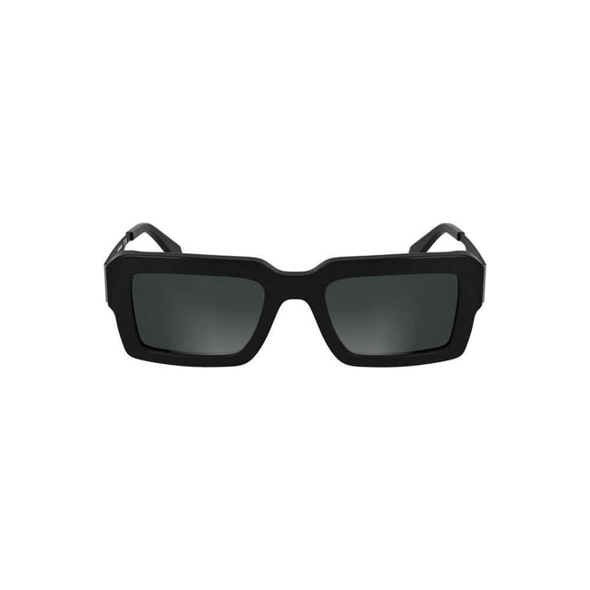 Black Acetate Women SunglassesElevate your gaze with the sleek sophistication of Calvin Klein’s acetate frame sunglasses. The epitome of sharp style, these striking rectangular lenses boast a seamless black tint, perfect for commanding presence and protec