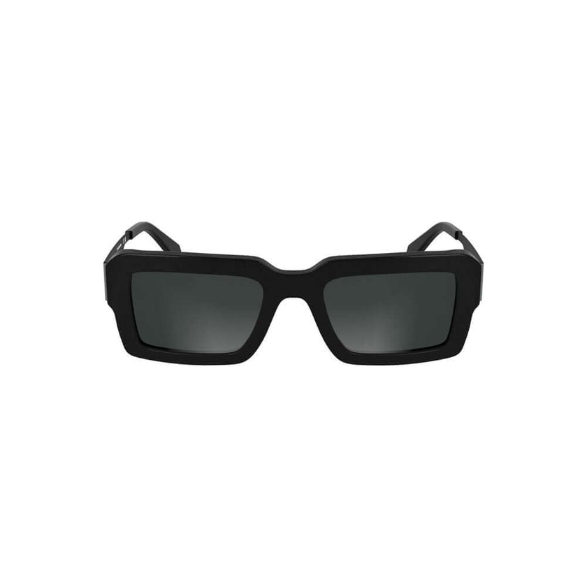 Black Acetate Women SunglassesElevate your gaze with the sleek sophistication of Calvin Klein’s acetate frame sunglasses. The epitome of sharp style, these striking rectangular lenses boast a seamless black tint, perfect for commanding presence and protec
