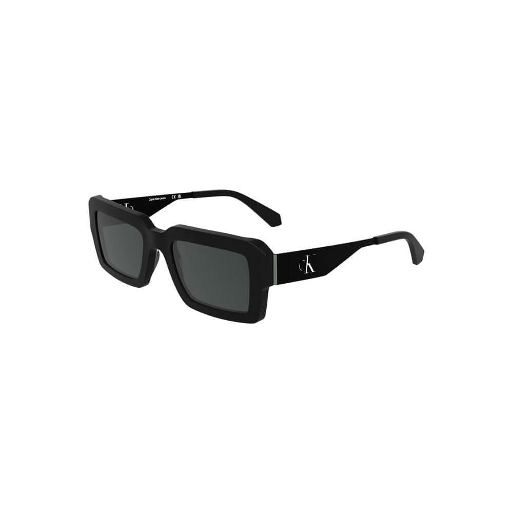 Black Acetate Women SunglassesElevate your gaze with the sleek sophistication of Calvin Klein’s acetate frame sunglasses. The epitome of sharp style, these striking rectangular lenses boast a seamless black tint, perfect for commanding presence and protec