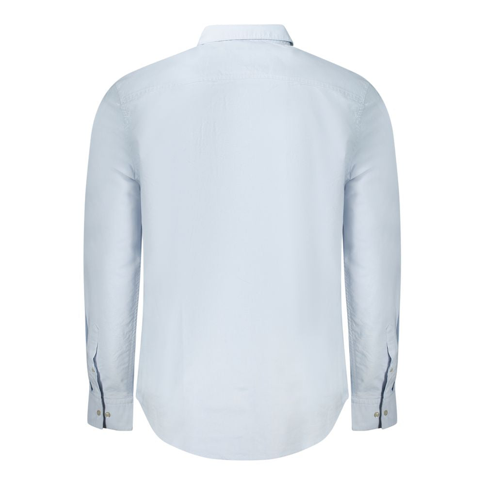 Light Blue Cotton Men ShirtElevate your wardrobe with the timeless sophistication of Calvin Klein. Tailored for a classic fit, this long sleeve shirt features a sharp button-down collar and adjustable 2-button cuffs. Detailed with exquisite embroidery and