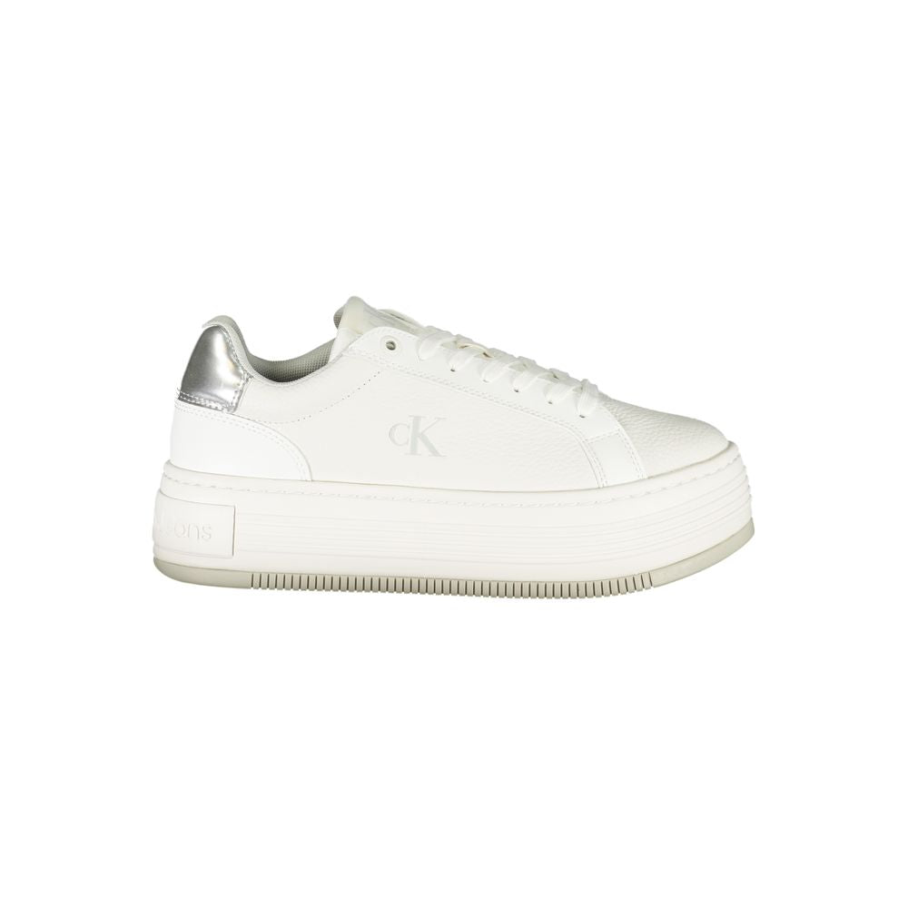 White Leather Women SneakerElevate your sneaker game with Calvin Klein’s eye-catching fusion of style and comfort. Designed for those with a penchant for the bold, these sneakers boast a sleek white profile accented with contrasting silver details that ca
