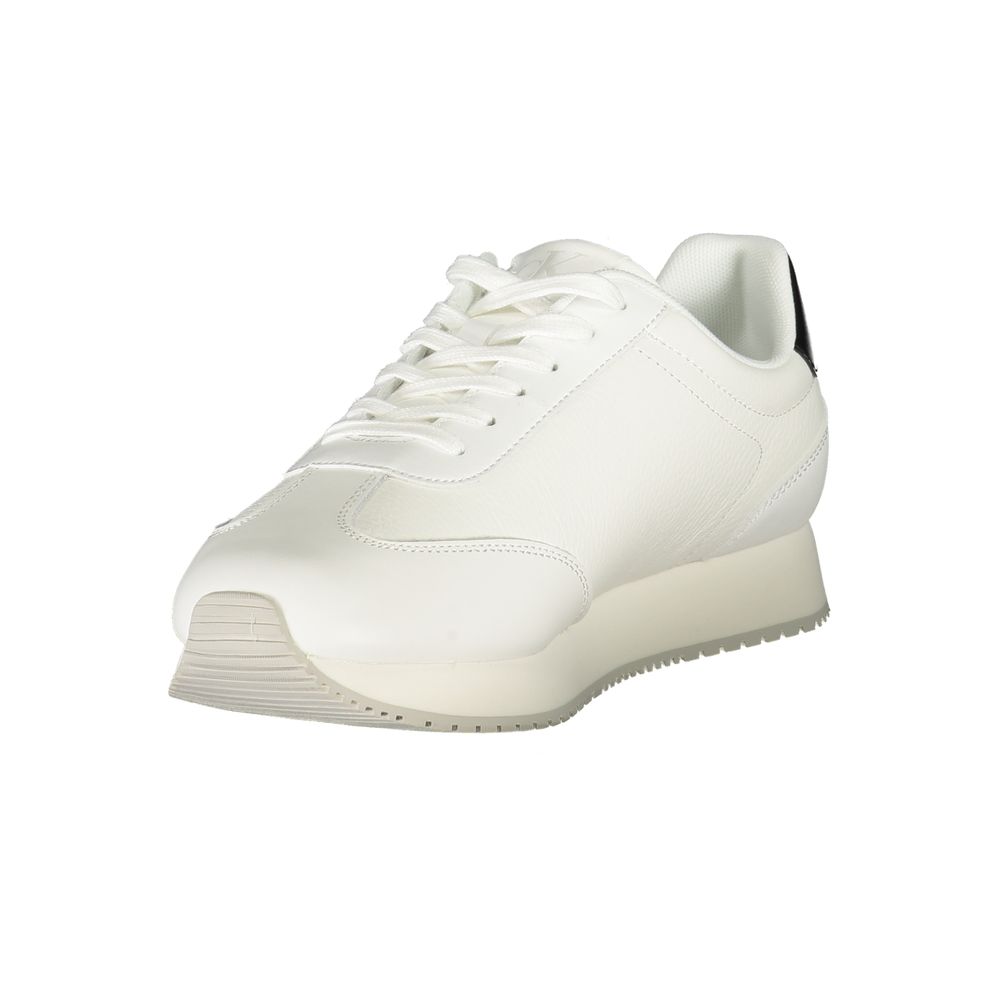 White Leather Men SneakerElevate your sneaker game with the sleek sophistication of Calvin Klein. These sports shoes meld function with fashion, featuring a sharp white backdrop punctuated by bold contrasting details in black. Designed for the dynamic man