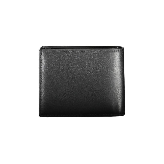 Black Polyethylene Men WalletElevate your essentials with the Calvin Klein dual-compartment wallet. Crafted for the modern man, this sleek piece is more than a mere accessory; it’s a statement. Equipped with RFID blocking technology, it safeguards your ca