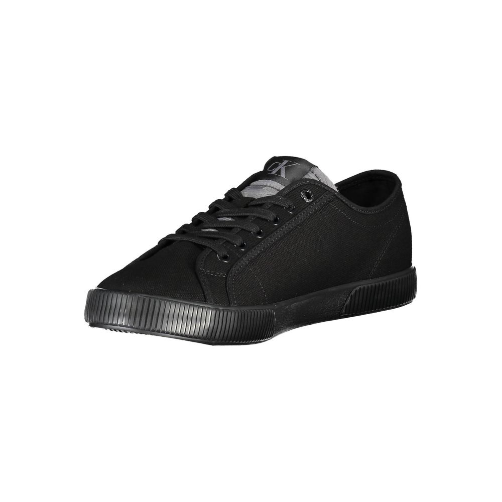 Black Cotton Men SneakerDiscover the ultimate fusion of eco-conscious fashion and sporty style with these Calvin Klein sneakers. Boldly designed with contrasting details and the brand’s iconic logo, these shoes embody a modern aesthetic that catches the e