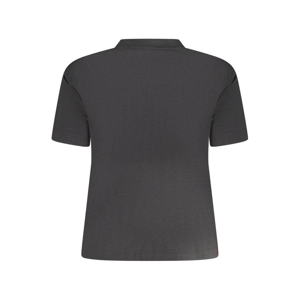 Black Cotton Women T-ShirtMake a powerful statement with Calvin Klein’s sleek black T-shirt. This essential piece simplifies luxury with its crisp crew neck and standout logo, providing an effortlessly cool addition to your wardrobe. Crafted from pure cot