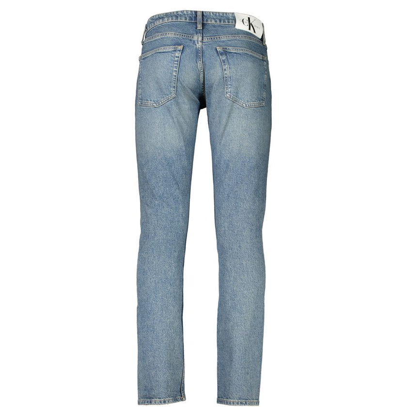 Blue Cotton Men JeansElevate your denim collection with these sleek Calvin Klein slim-fit jeans. Crafted with a nod to sustainability, featuring 20% recycled cotton, these jeans blend comfort with eco-conscious fashion. The classic blue hue, accented with