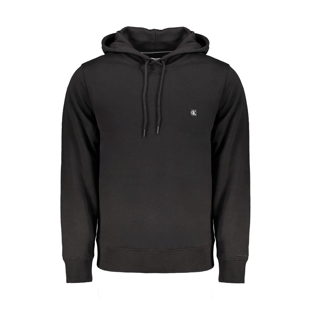 Black Cotton Men SweaterElevate your casual wardrobe with the sophisticated edge of Calvin Klein. This sleek black sweatshirt is expertly crafted with a blend of regenerative cotton and polyester, offering both comfort and durability. The classic design f