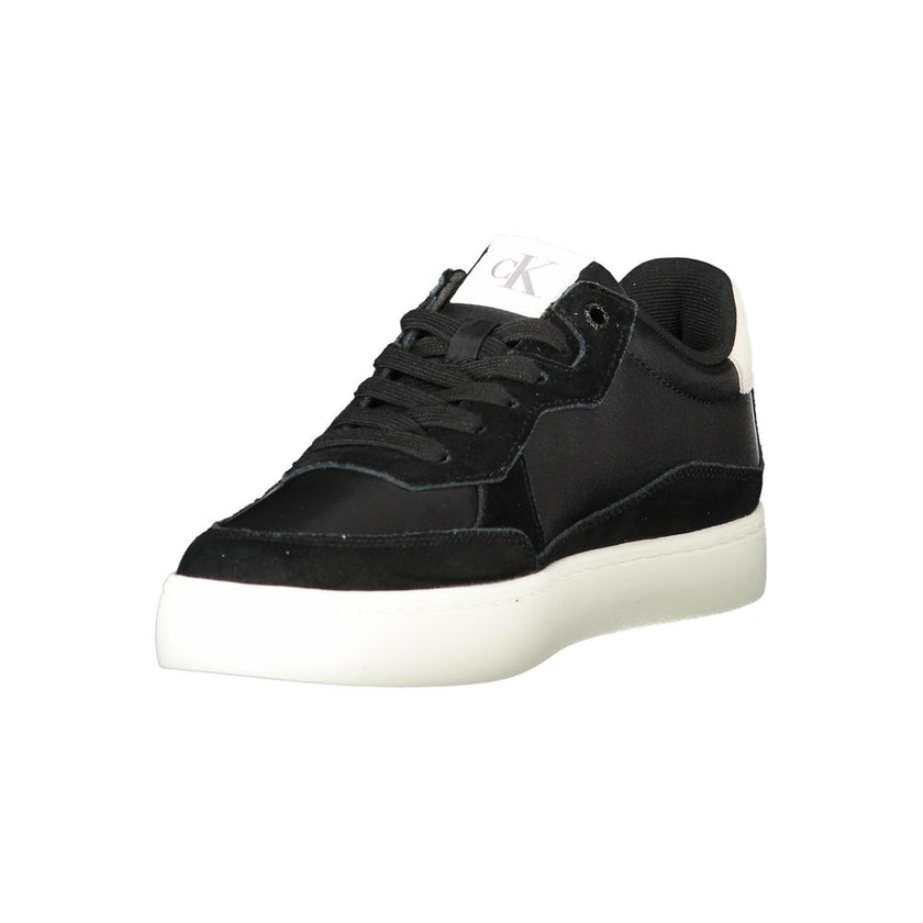 Black Polyester Men SneakerUnleash your stride in the dynamic allure of Calvin Klein’s exquisitely crafted sneakers. The fusion of deep black hues, a striking print, and contrasting white details delivers an athletic yet sophisticated silhouette. A remova