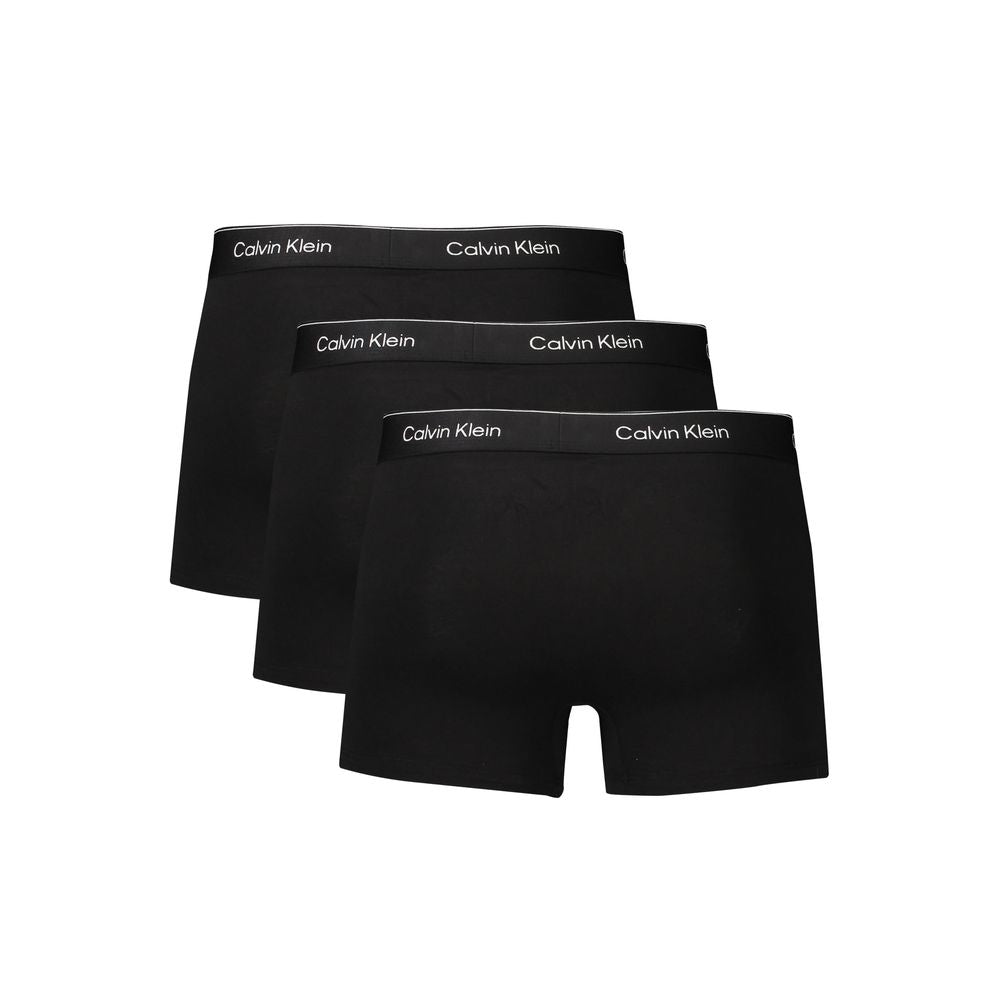 Black Cotton Men UnderwearUnleash effortless style even in the most intimate of ensembles with Calvin Klein’s tri-pack of boxer briefs. Crafted with 95% regenerative cotton, these sleek black boxers offer comfort that conforms to your every move, featurin