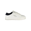White Leather Men SneakerElevate your sneaker game with Calvin Klein’s striking sports shoe, seamlessly fusing function with high fashion. The crisp white silhouette, adorned with contrasting blue accents, embodies modern design while ensuring comfort thr