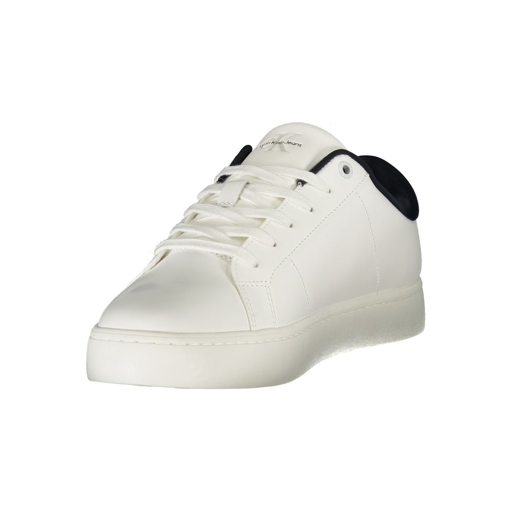 White Leather Men SneakerElevate your sneaker game with Calvin Klein’s striking sports shoe, seamlessly fusing function with high fashion. The crisp white silhouette, adorned with contrasting blue accents, embodies modern design while ensuring comfort thr