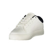 White Leather Men SneakerElevate your sneaker game with Calvin Klein’s striking sports shoe, seamlessly fusing function with high fashion. The crisp white silhouette, adorned with contrasting blue accents, embodies modern design while ensuring comfort thr