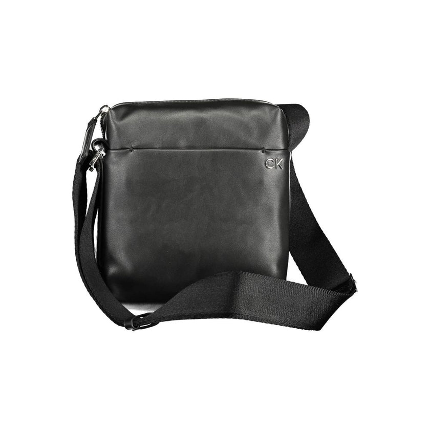 Black Polyester Men Shoulder BagElevate your style quotient with the Calvin Klein shoulder bag—where functionality meets eco-conscious fashion. Boasting a sleek black hue, this bag features an adjustable strap for customized carrying comfort, along with a