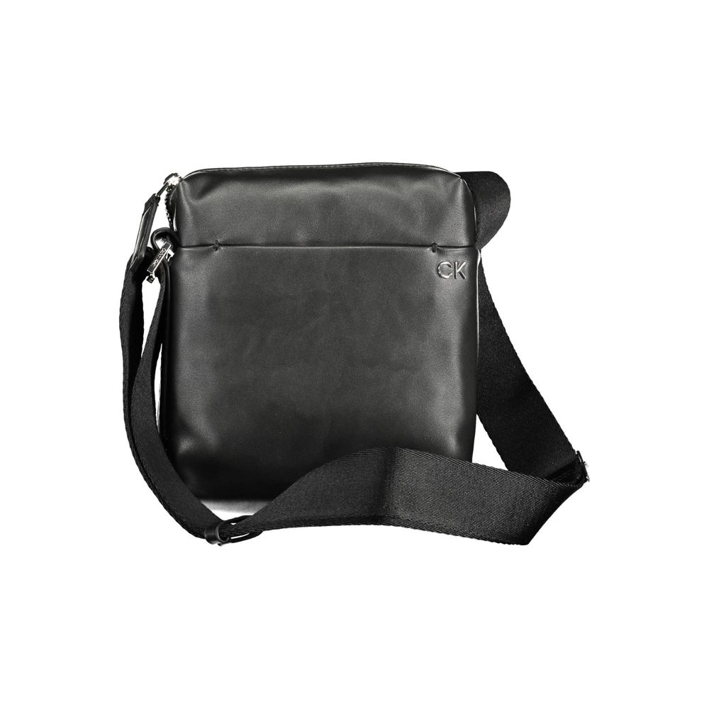 Black Polyester Men Shoulder BagElevate your style quotient with the Calvin Klein shoulder bag—where functionality meets eco-conscious fashion. Boasting a sleek black hue, this bag features an adjustable strap for customized carrying comfort, along with a