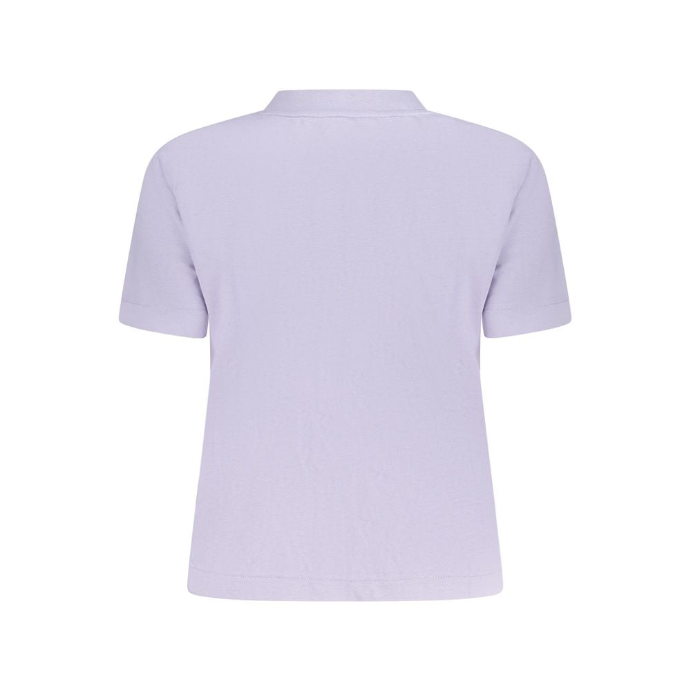 Purple Cotton Women T-ShirtElevate your everyday style with the essence of bold minimalism. This Calvin Klein T-shirt boasts a sleek purple hue that captures attention without trying. Featuring a classic crew neck and short sleeves, the iconic Calvin Klei