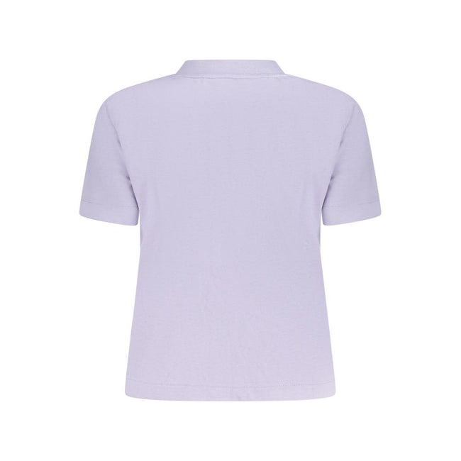 Purple Cotton Women T-ShirtElevate your everyday style with the essence of bold minimalism. This Calvin Klein T-shirt boasts a sleek purple hue that captures attention without trying. Featuring a classic crew neck and short sleeves, the iconic Calvin Klei