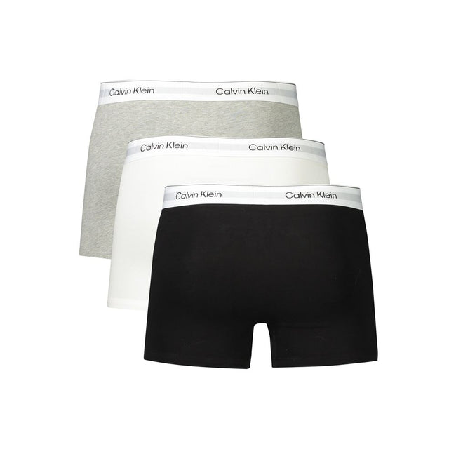 Brown Cotton Men BoxerElevate your essentials with Calvin Klein’s chic trio of boxers, designed to provide unparalleled comfort with a fashion-forward edge. Each pack offers a versatile palette of white, grey, and black, accented by the iconic white elast
