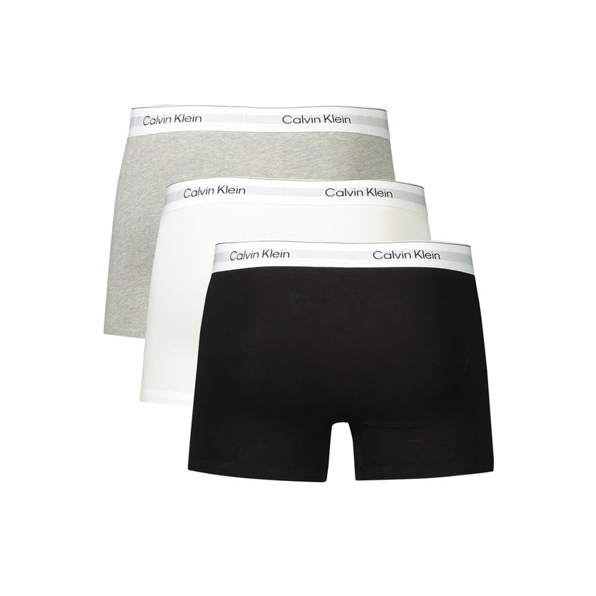Brown Cotton Men BoxerElevate your essentials with Calvin Klein’s chic trio of boxers, designed to provide unparalleled comfort with a fashion-forward edge. Each pack offers a versatile palette of white, grey, and black, accented by the iconic white elast