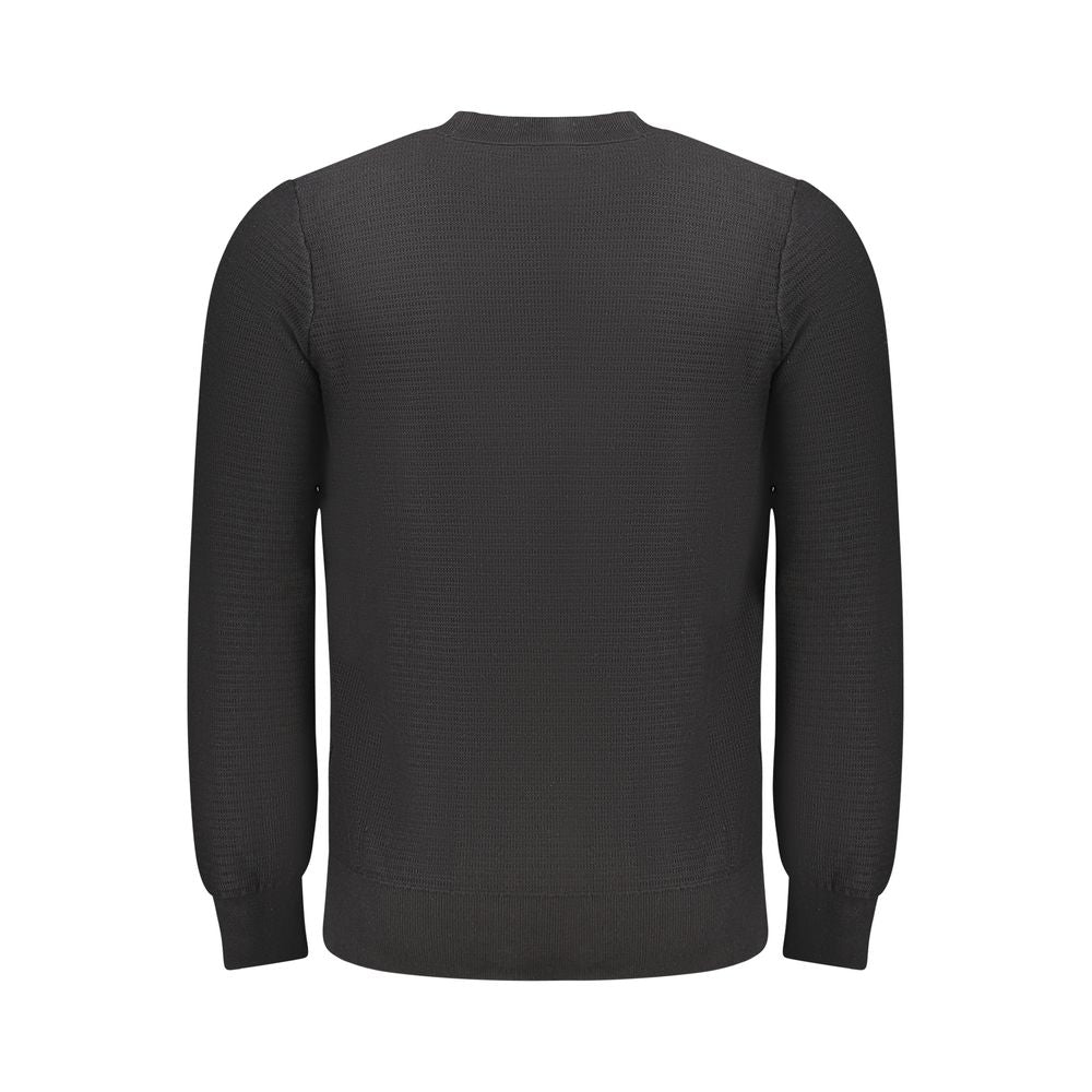 Black Cotton Men SweaterExperience the epitome of sleek sophistication with this Hugo Boss long-sleeved t-shirt. Crafted with impeccable attention to detail, its luxurious blend of 95% cotton and 5% cashmere ensures a touch of indulgence with every wear.