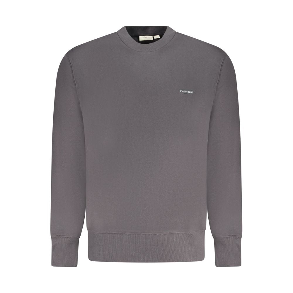 Black Cotton Men SweaterStep into the epitome of sleek style and comfort with this Calvin Klein sweatshirt. Its brushed texture adds a layer of luxury, while the classic crew neck design is adorned with a signature logo, showcasing your affinity for sophi