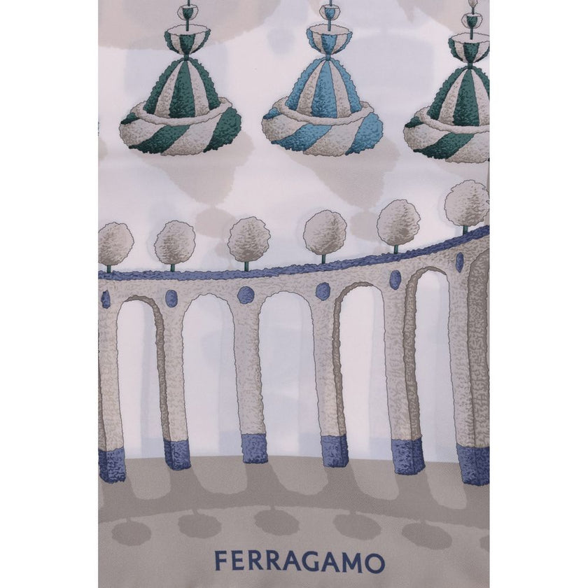 Multicolor Silk ScarfFerragamo’s silk Scarf comes in an elegant and versatile square shape. Featuring a vibrant multicolor print, it is embellished with iconic contrasting monograms that enhance its refined design. Measuring 90 cm x 90 cm, it is perfect f