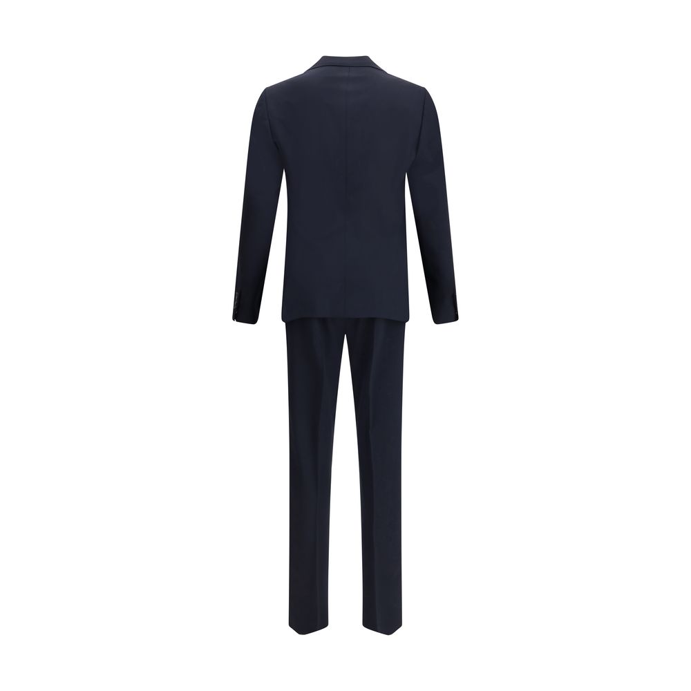 Black Fleece Wool Two-Piece SuitDsquared2 Virgin Wool London Suit, consisting of jacket and pants. Wool blazer jacket, front button closure, three welt pockets on the front with flap, one slit pocket on the front, peaked lapels. Classic wool pants, front
