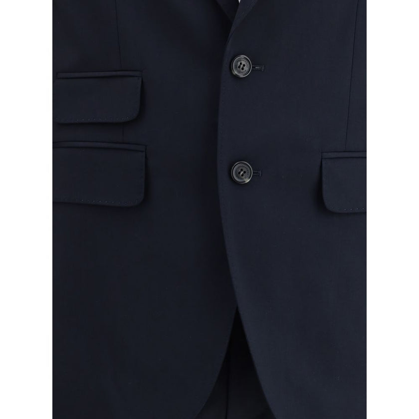 Black Fleece Wool Two-Piece SuitDsquared2 Virgin Wool London Suit, consisting of jacket and pants. Wool blazer jacket, front button closure, three welt pockets on the front with flap, one slit pocket on the front, peaked lapels. Classic wool pants, front