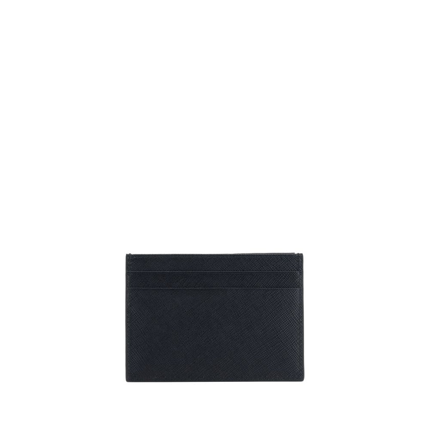 Black Calf Leather Bos Taurus WalletPrada’s Leather Card Holder is a compact and stylish accessory perfect for everyday use. Featuring card slots on the front and back, it combines functionality and style in an essential design. The iconic enameled triang