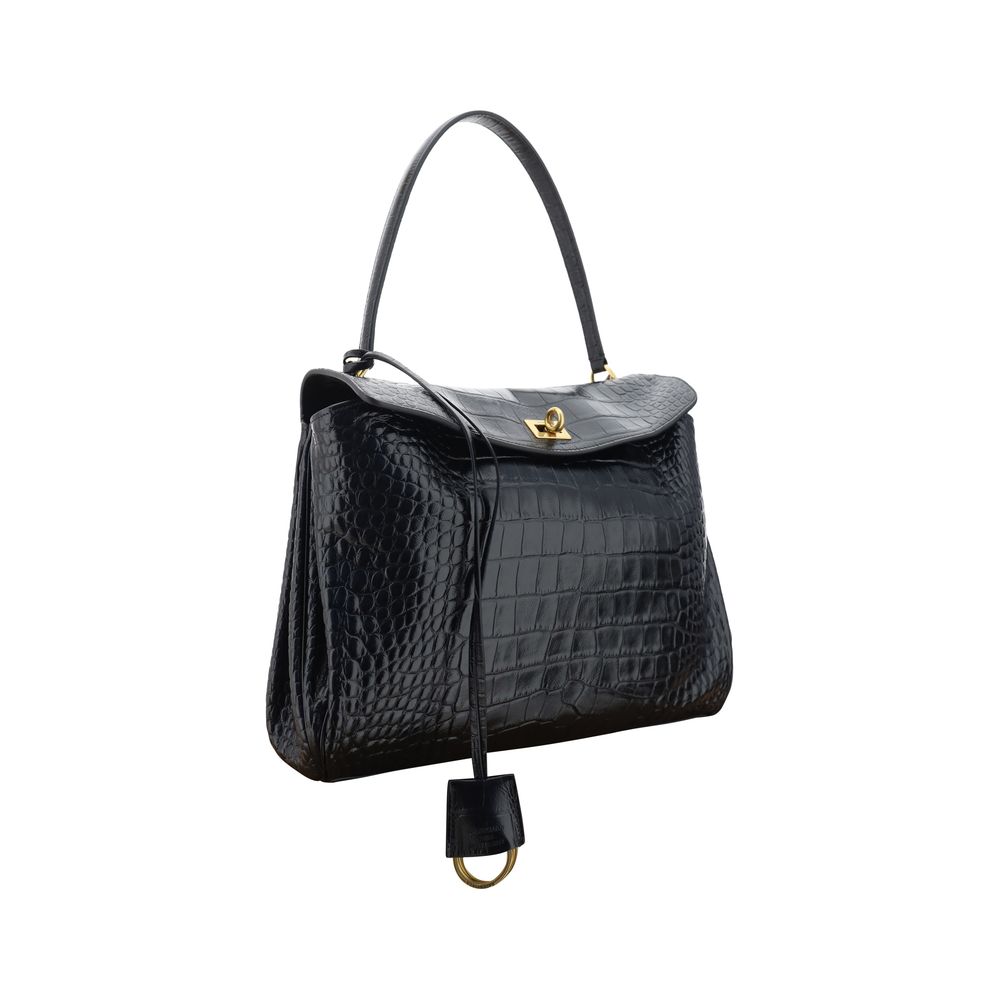 Black Calf Leather Bos Taurus HandbagLeather Medium Rodeo Handbag by Balenciaga, single removable top handle, charm with key ring detail applied at base of handle, dual compartment, flap closure with swivel system at front, crocodile-effect leather design