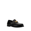 Black Calf Leather Bos Taurus Slip-On LoafersVersace’s leather Loafers combine classic elegance with iconic details. Featuring a slightly elongated round toe and a leather block heel, they feature a front tray embellished with a plaque featuring the iconi