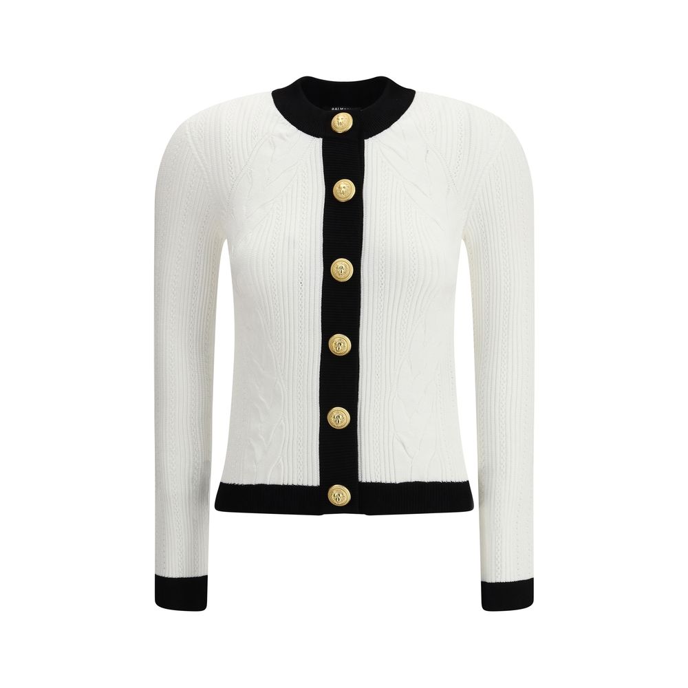 White Viscose CardiganBalmain’s Contrast Trim Cardigan features a ribbed and braided design enhanced by a silhouette-defining ribbed crew neck and hem. The front closure is embellished with embossed gold buttons, an iconic detail that adds a touch of luxu