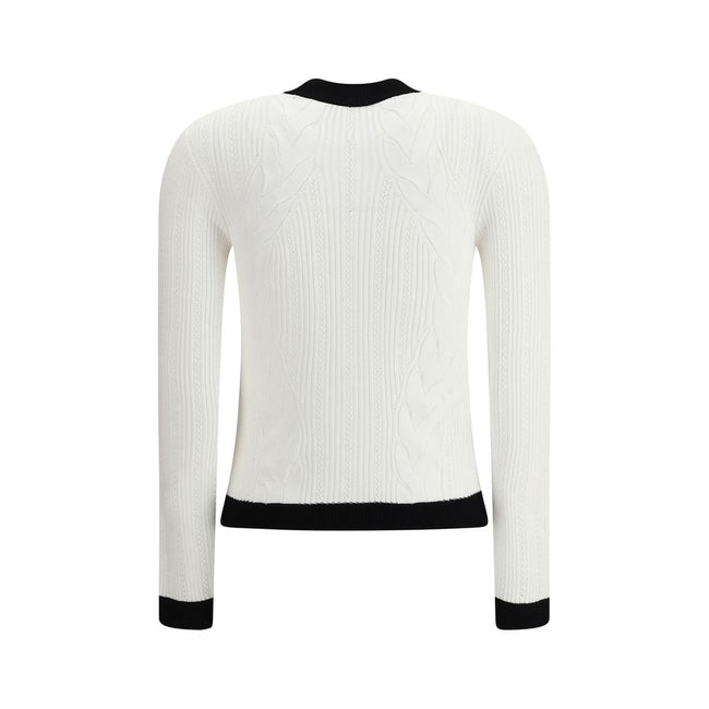 White Viscose CardiganBalmain’s Contrast Trim Cardigan features a ribbed and braided design enhanced by a silhouette-defining ribbed crew neck and hem. The front closure is embellished with embossed gold buttons, an iconic detail that adds a touch of luxu