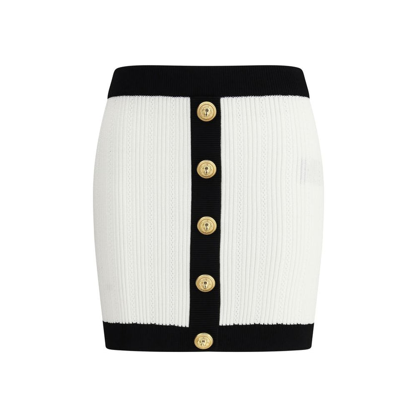 White Viscose Mini SkirtBalmain’s mini Skirt enhances the silhouette with a refined ribbed knit. Decorative gold metal 