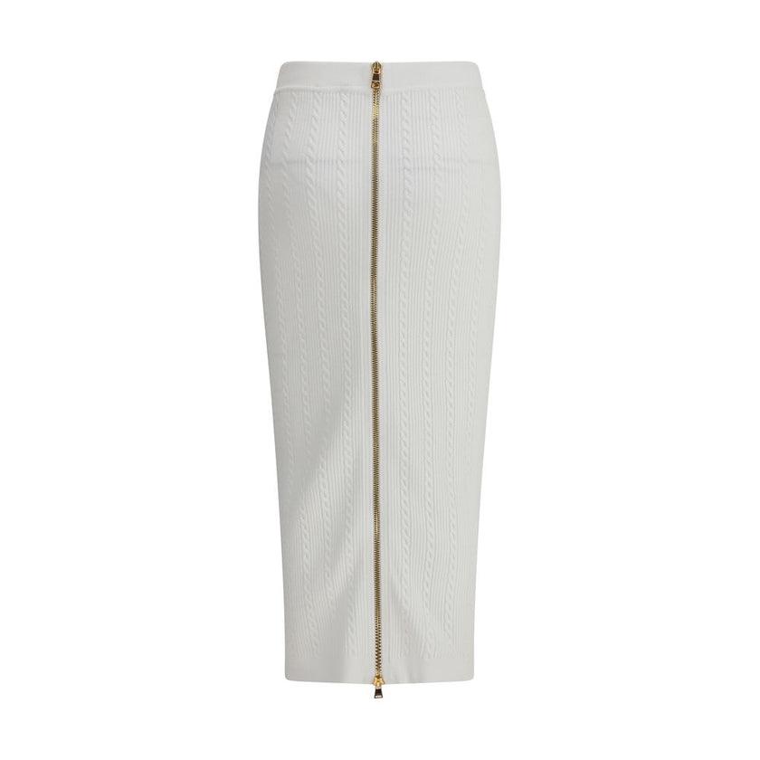 White Viscose Midi SkirtBalmain’s midi Skirt enhances the silhouette with a ribbed and twisted knit, giving structure and movement to the garment. On the front, the characteristic decorative 