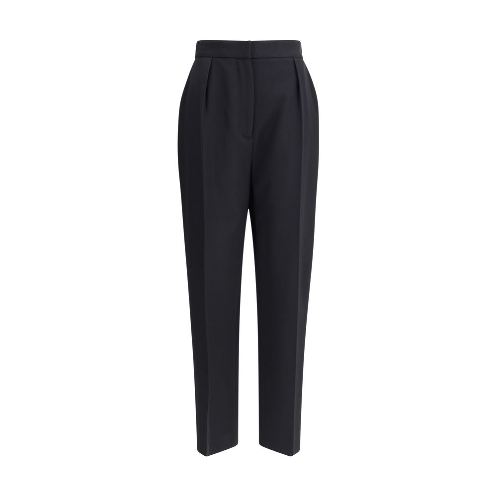 Black Wool Dress PantsBalmain’s grain de poudre tailored Pants express elegance and rigor with an impeccable cut. Featuring a sash at the waist, they feature a concealed zipper and hook-and-eye closure under the flap and ironed pleats at the front, which
