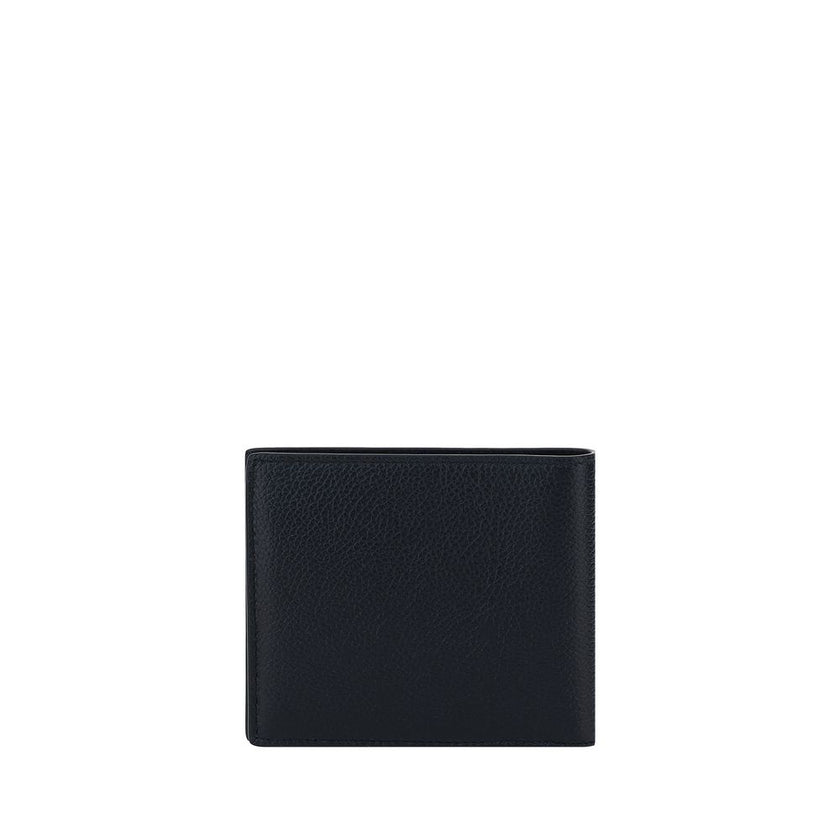 Black Calf Leather Bos Taurus WalletBalenciaga’s Leather Wallet is an essential accessory with a strong character. Featuring a bill fold design, it features the iconic contrasting logo on the front, giving it a distinctive and contemporary touch. The inte