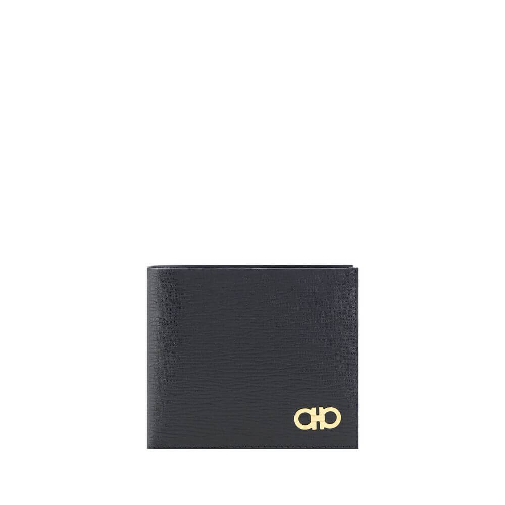 Black Calf Leather Bos Taurus WalletCalfskin Wallet by Ferragamo, billfold design, plaque with iconic Gancini logo applied on front, interior card slot, bill compartment. Season: AW25 Dimension: 11.5×11.5 Composition: 100% Calf Leather Bos Taurus MADE IN