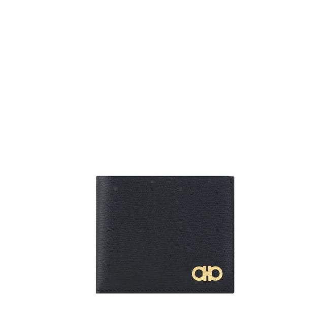 Black Calf Leather Bos Taurus WalletCalfskin Wallet by Ferragamo, billfold design, plaque with iconic Gancini logo applied on front, interior card slot, bill compartment. Season: AW25 Dimension: 11.5×11.5 Composition: 100% Calf Leather Bos Taurus MADE IN