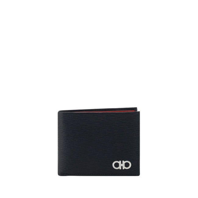 Black Calf Leather Bos Taurus WalletLeather Wallet by Ferragamo is an elegant accessory with a billfold design that is compact and refined. On the front it is embellished with a plaque bearing the iconic Gancini logo, the distinctive symbol of the maison.