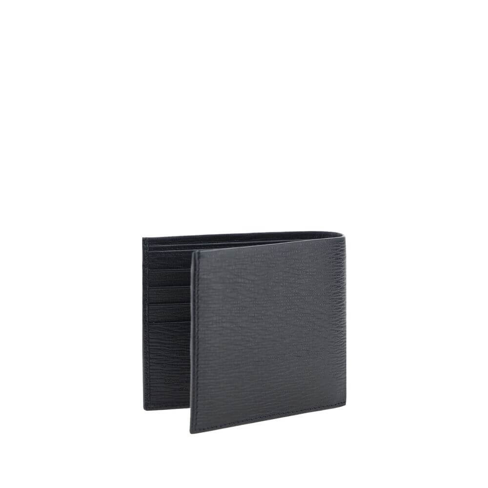 Black Calf Leather Bos Taurus WalletCalfskin Wallet by Ferragamo, billfold design, plaque with iconic Gancini logo applied on front, interior card slot, bill compartment. Season: AW25 Dimension: 11.5×11.5 Composition: 100% Calf Leather Bos Taurus MADE IN