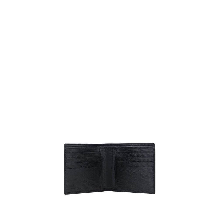 Black Calf Leather Bos Taurus WalletCalfskin Wallet by Ferragamo, billfold design, plaque with iconic Gancini logo applied on front, interior card slot, bill compartment. Season: AW25 Dimension: 11.5×11.5 Composition: 100% Calf Leather Bos Taurus MADE IN