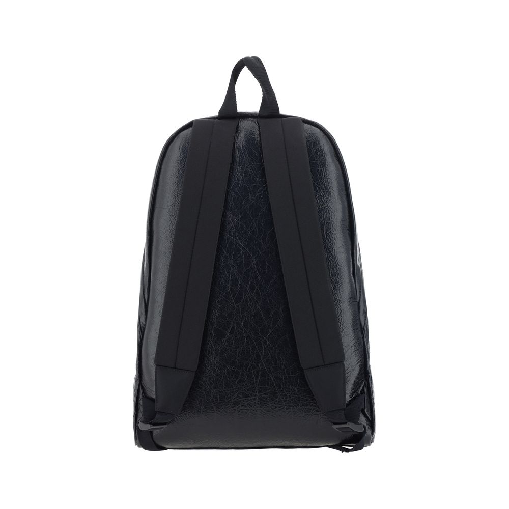 Explorer BackpackCalfskin Explorer Backpack by Balenciaga, double-slider zipper closure, contrasting printed logo on front, front patch pocket with zipper, top handle, adjustable padded shoulder straps, interior slit pocket, lined interior. Season: AW25 D