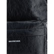 Explorer BackpackCalfskin Explorer Backpack by Balenciaga, double-slider zipper closure, contrasting printed logo on front, front patch pocket with zipper, top handle, adjustable padded shoulder straps, interior slit pocket, lined interior. Season: AW25 D