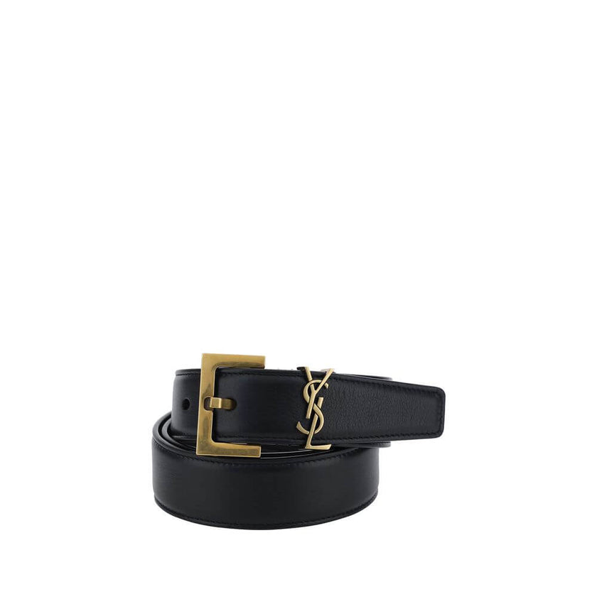 Black Calf Leather Bos Taurus Regular BeltThe Saint Laurent leather Belt is a sophisticated accessory with an essential and refined design. Made of smooth leather, it features a front plaque with the brand’s iconic brass-plated logo, adding a touch of cha